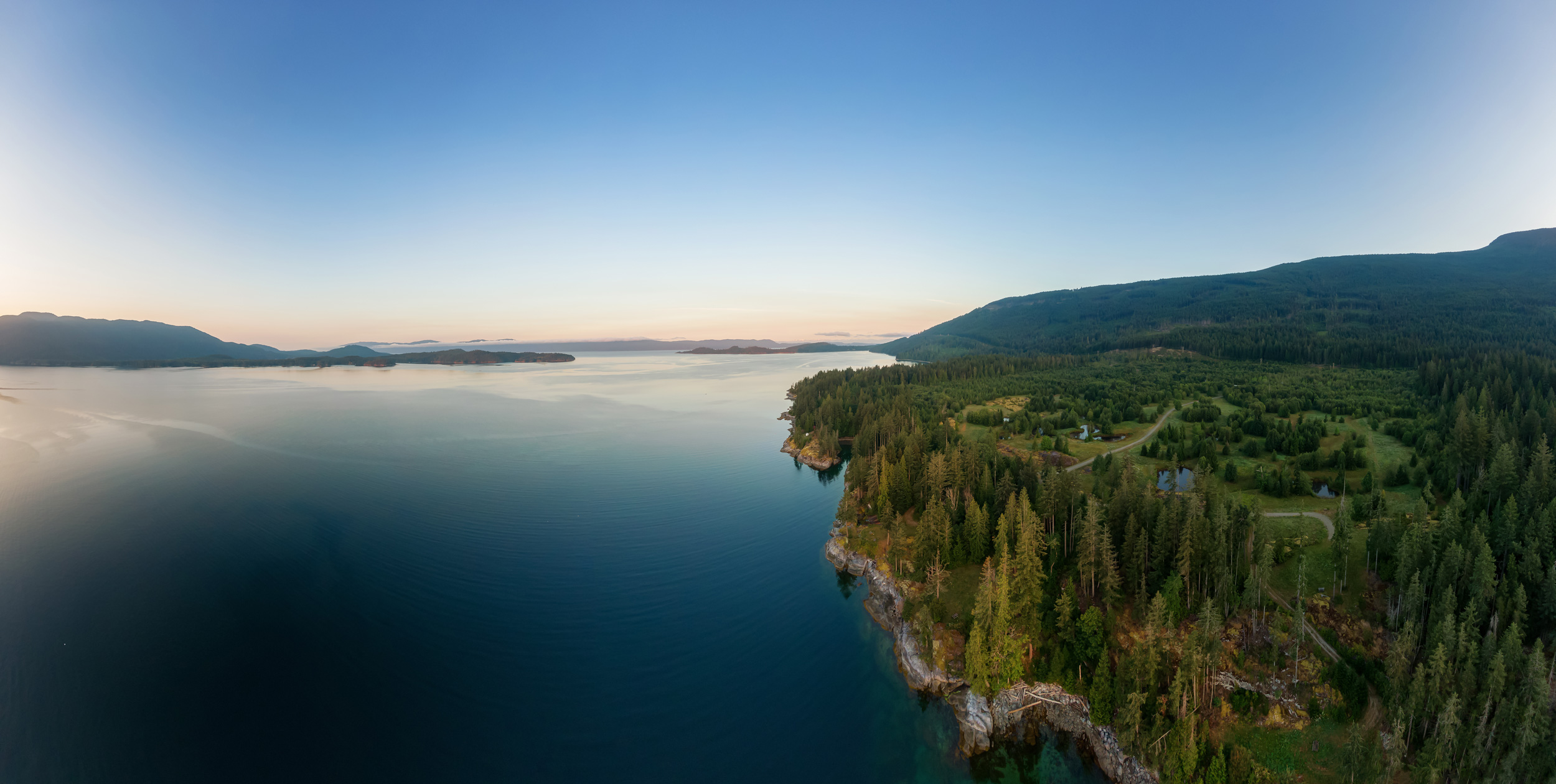 Aerial view of Mermaid Cove on the Sunshine Coast in BC. Beautiful sunset.